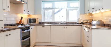 Fridge, dishwasher, electric kettle, toaster