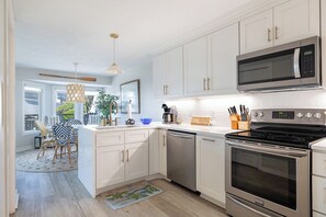 Fridge, microwave, dishwasher, coffee/tea maker