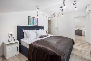 4 slaapkamers, een strijkplank/strijkijzer, gratis wifi, beddengoed