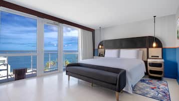 Suite, 1 cama King size, vista al océano, en esquina | Caja de seguridad en la habitación y escritorio