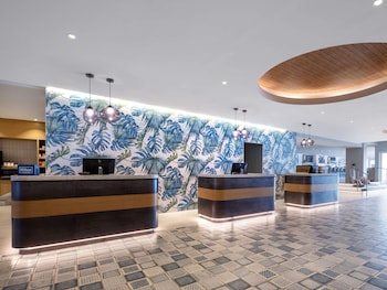 Hotel entrance and lobby at Hilton Garden Inn San Juan Condado