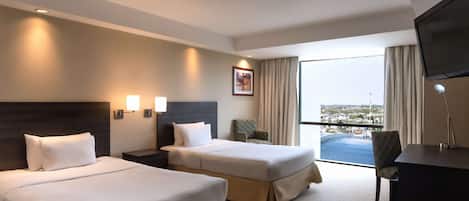 Ropa de cama de alta calidad, cubrecamas y minibar