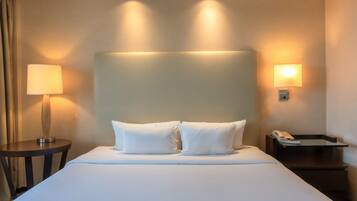 Ropa de cama de alta calidad, cubrecamas y minibar