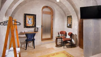 Family Triple Room | Living area | 32-inch LED TV with satellite channels