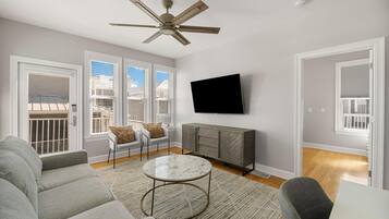 House | Living area | 60-inch Smart TV with digital channels, Netflix, Hulu