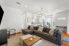House | Living area | 60-inch Smart TV with digital channels, Netflix, Hulu
