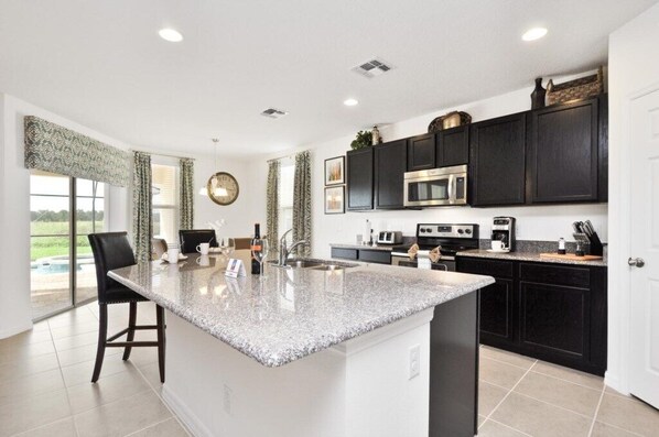 Fridge, microwave, oven, stovetop - Beautiful Pool Home with Game Room-1303YC (Davenport)