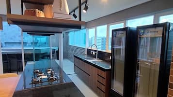 Microwave, stovetop, blender, cookware/dishes/utensils