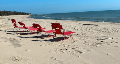 New Listing. Family-friendly home, private sandy beach on Lake Michigan!