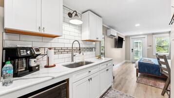 Microwave, coffee/tea maker, cookware/dishes/utensils