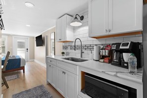 Microwave, coffee/tea maker, cookware/dishes/utensils