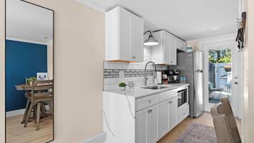 Microwave, coffee/tea maker, cookware/dishes/utensils