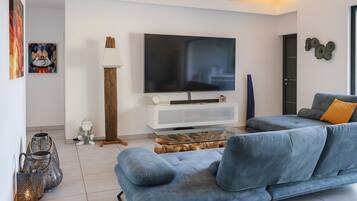 Smart TV, video games, DVD player, foosball