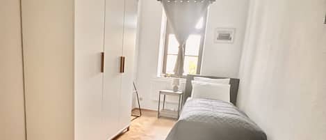 2 bedrooms, desk, iron/ironing board, travel cot