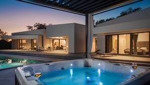 A modern house with a swimming pool and a hot tub. - Luxury Villa Mauve with Pool (Režanci)