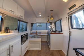 Microwave, coffee/tea maker, cookware/dishes/utensils, dining tables - Air Village Creekside Unit #5 (Prescott)