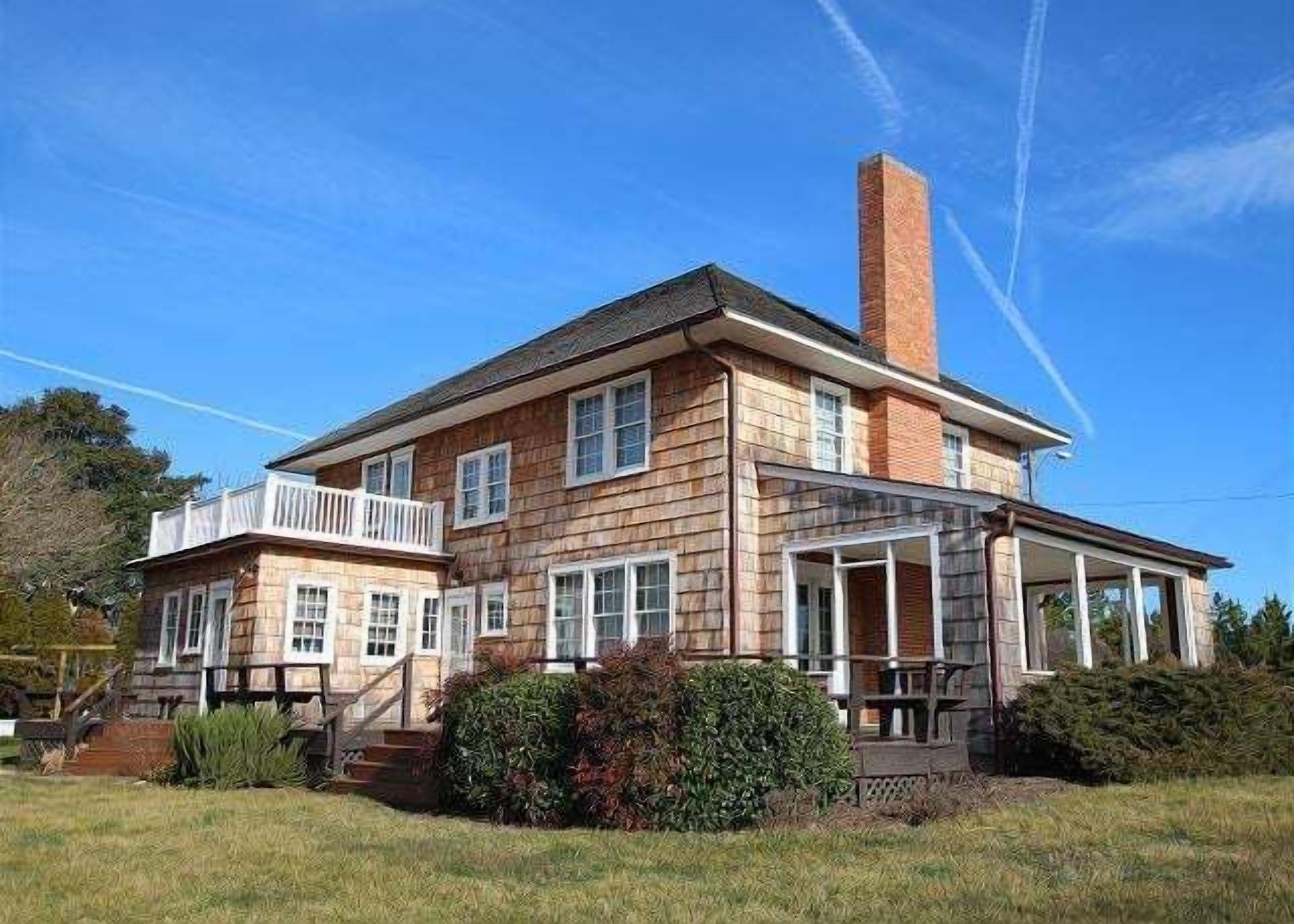 Large single-family home in North Rehoboth conveniently located directly across from a beach access point.