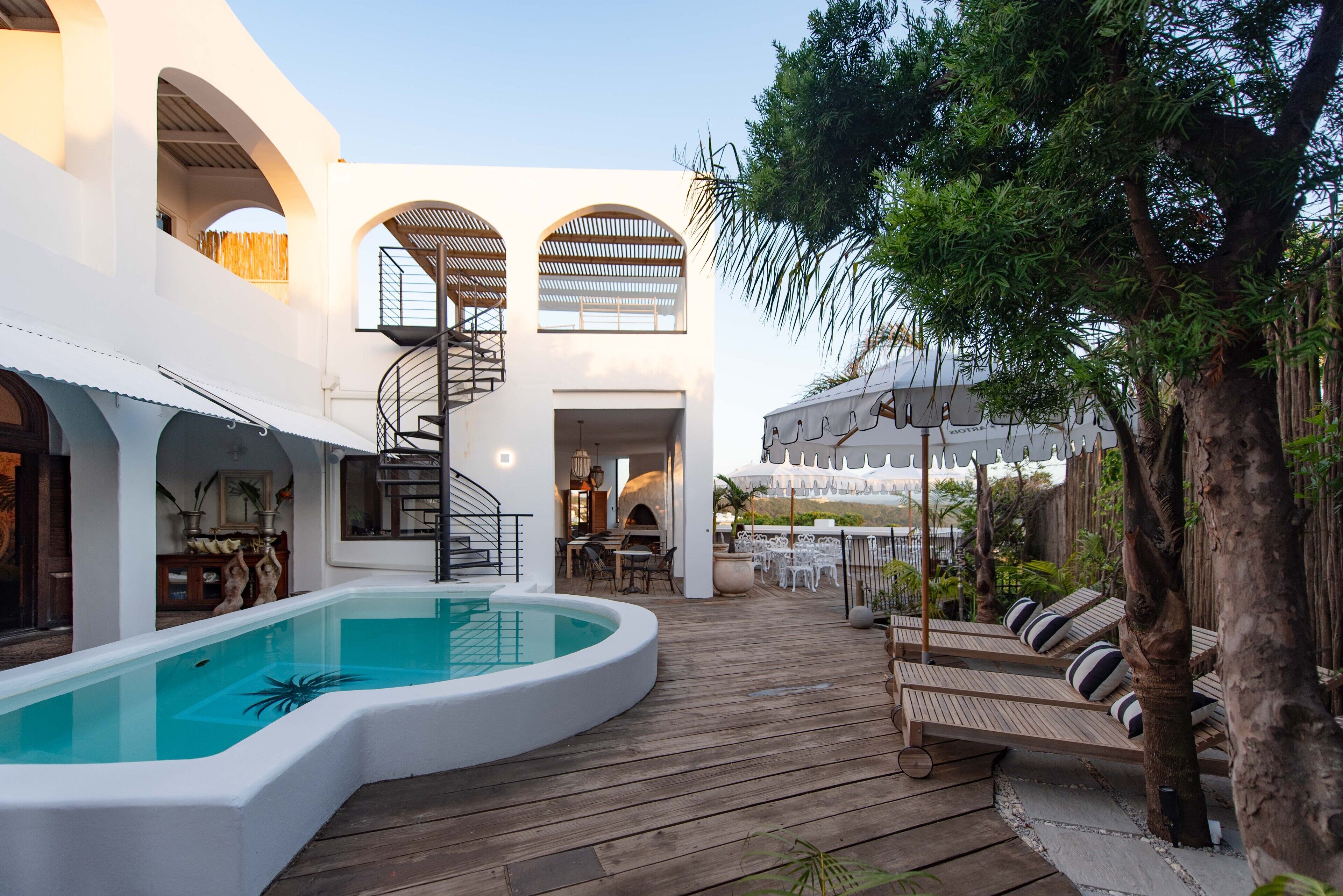 Outdoor pool, open 7:00 AM to 10:00 PM, pool umbrellas, sun loungers