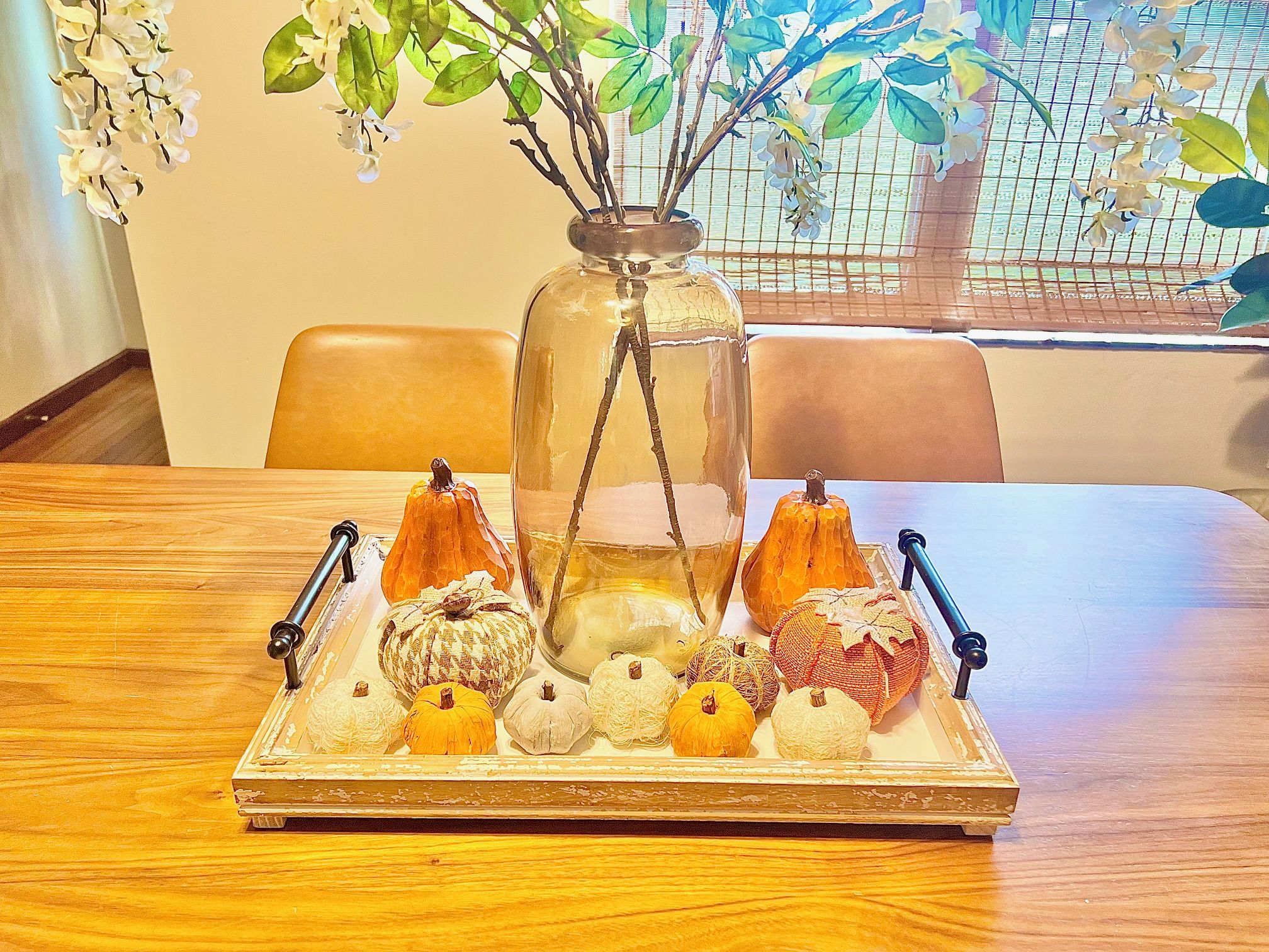 Vibrant pumpkins create an inviting autumn atmosphere perfect for a cozy getaway.