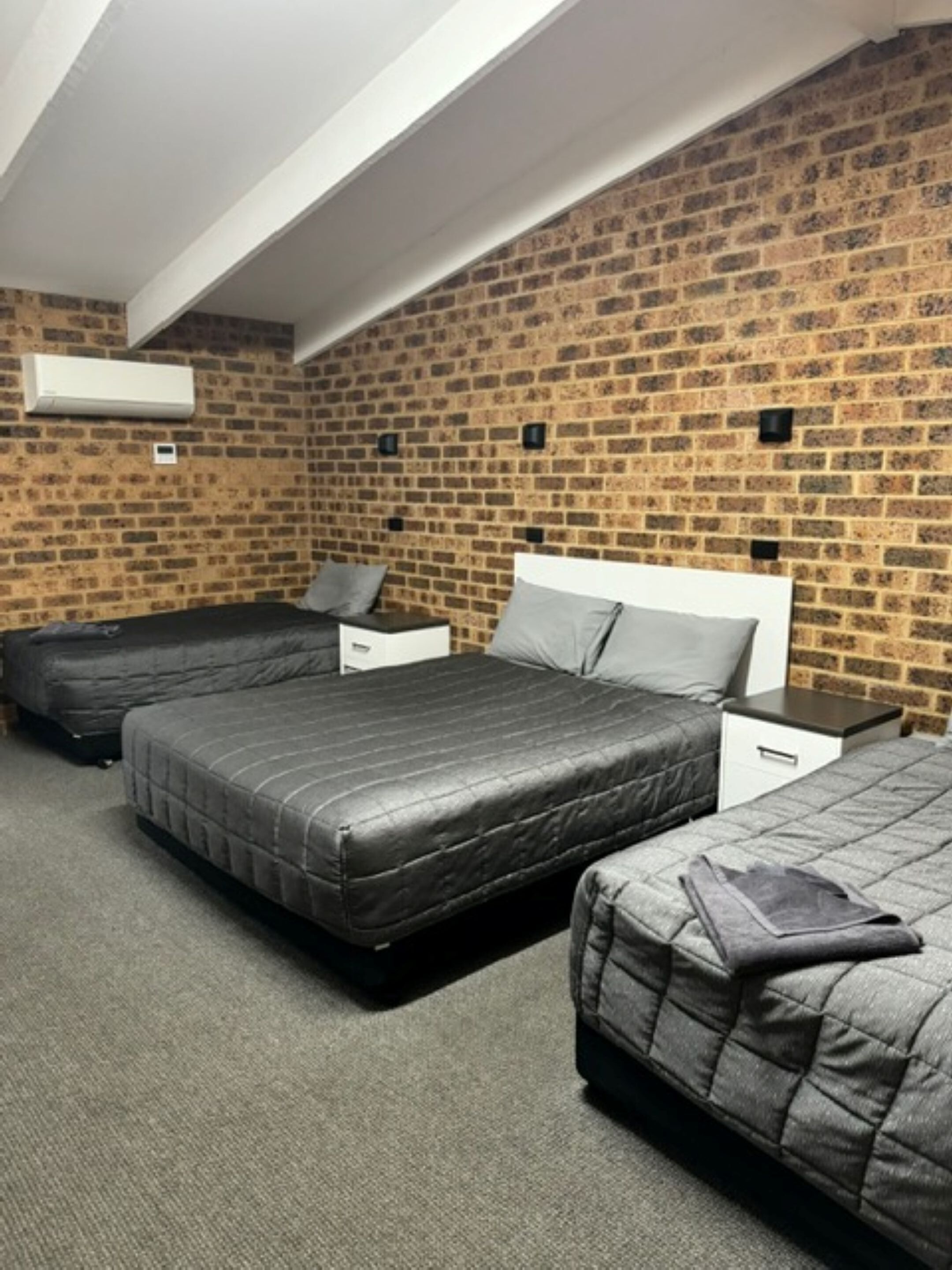 Habitación cuádruple familiar | Escritorio y espacio para trabajar con un portátil