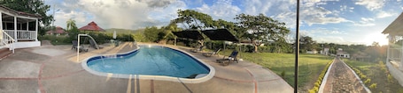 Outdoor pool, open 8:30 AM to 8:30 PM, pool umbrellas, pool loungers. HOTEL CAMPESTRE LAS PALOMAS