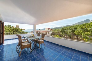 Outdoor dining - ATTIC SEA VIEW: delightful penthouse with central sea view (Cala Gonone)