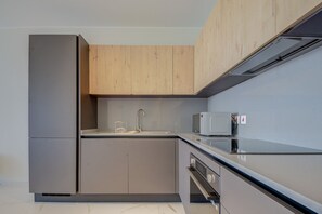 Fridge, microwave, oven, stovetop - Three Bedroom Suite 9 (Swieqi)