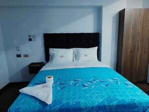 Suite exclusiva | 1 dormitorio, edredones de plumas, mobiliario individual y escritorio