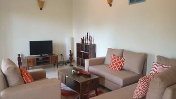 Comfort Apartment | Ruang tamu | Pencetak