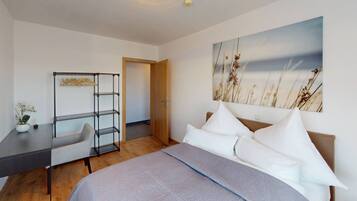 1 slaapkamer, een strijkplank/strijkijzer, reisbedje, wifi