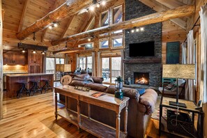 Télévision, cheminée, baby-foot