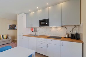 Microwave, stovetop, coffee/tea maker, toaster