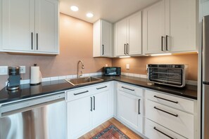 Fridge, microwave, dishwasher, coffee/tea maker