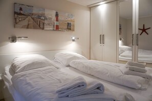 2 chambres, fer et planche à repasser, Wi-Fi, draps fournis