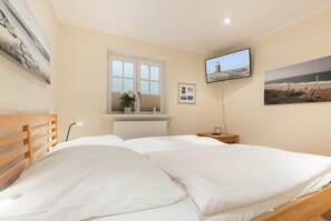 2 habitaciones, tabla de planchar con plancha, wifi y ropa de cama