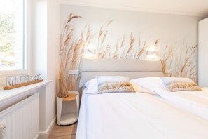 1 slaapkamer, een strijkplank/strijkijzer, wifi, beddengoed