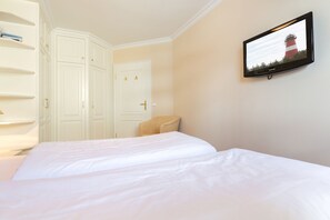 1 chambre, fer et planche Ă repasser, Wi-Fi, draps fournis