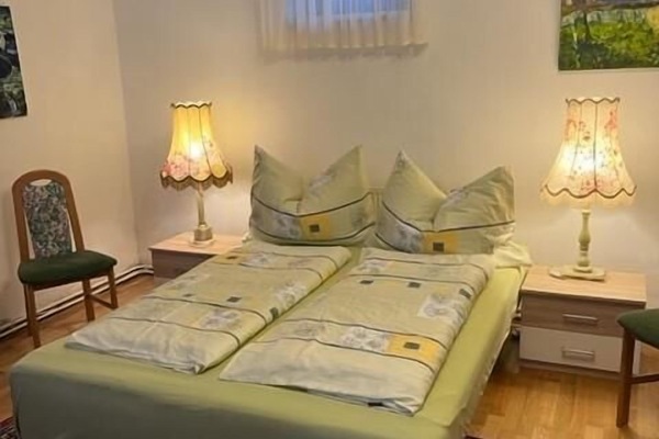 Ferienwohnung (50qm) mit Ofen-Schlafzimmer