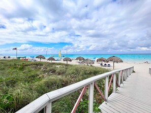 On the beach, white sand, beach towels