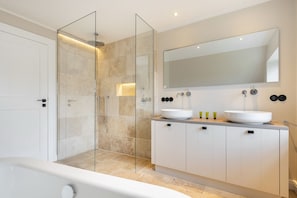 Shower, hair dryer, towels, soap