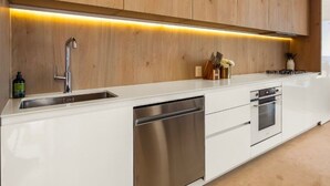 Coffee/tea maker, fridge, microwave, oven
