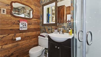 Shower, towels, soap, toilet paper