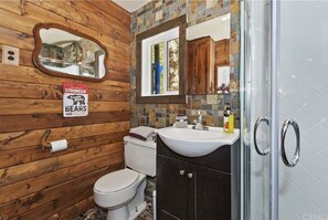 Shower, towels, soap, toilet paper