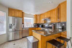 Fridge, microwave, oven, stovetop - Dreamy San Jose 3BR w/ Backyard, near Houge Park & Hikes, by Blueground (South Bay)