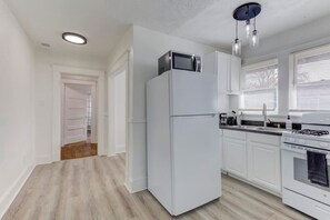 Fridge, microwave, oven, stovetop - Modern Gem in Cooper-Young: Remodeled Haven (Memphis)