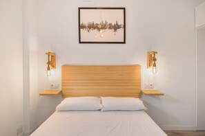 1 habitación, tabla de planchar con plancha, wifi gratis y ropa de cama 