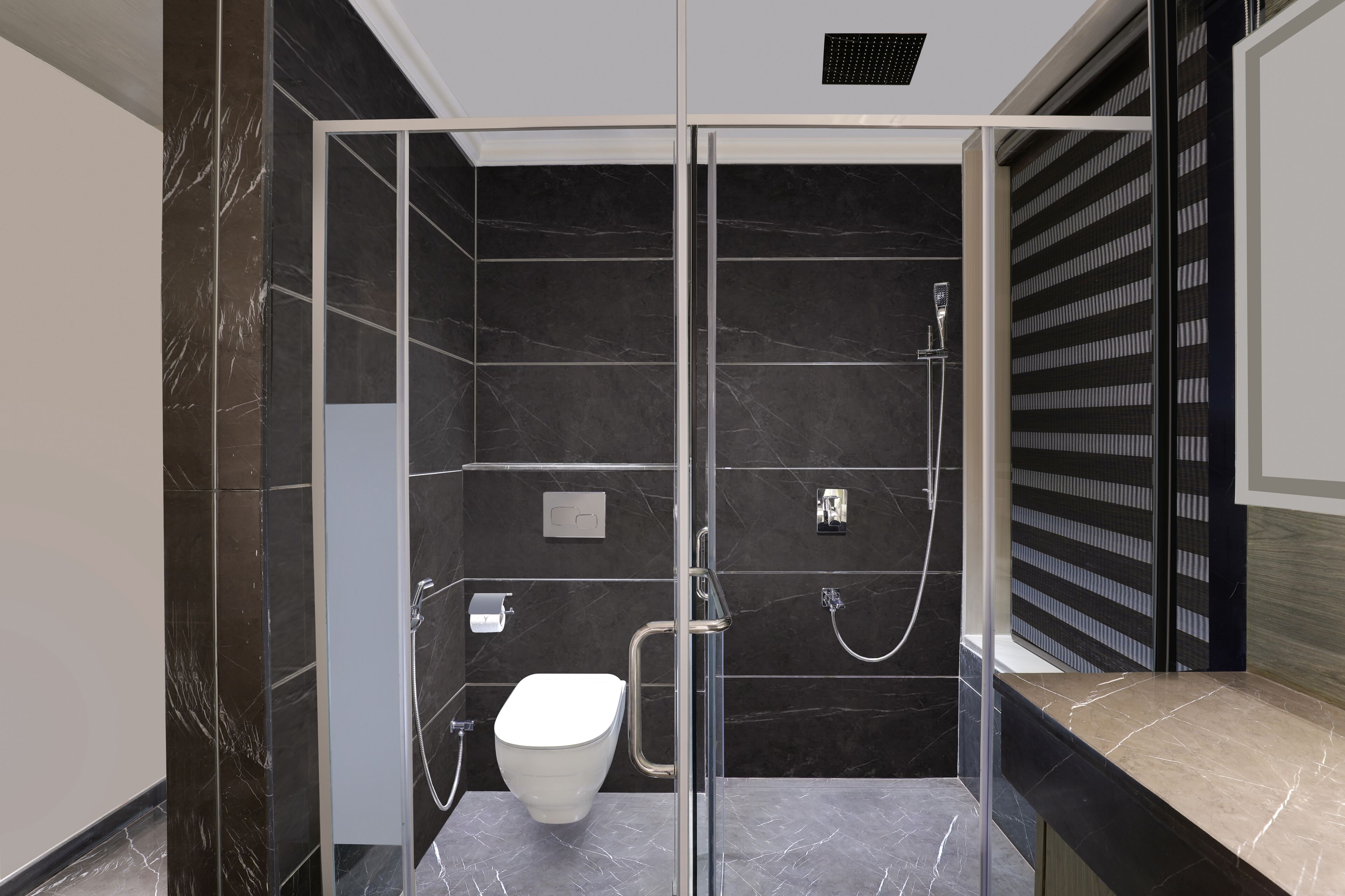 Ein modernes Badezimmer mit einer Duschkabine, einer Toilette und einem Waschbecken.