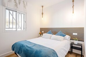 2 dormitorios, tabla de planchar con plancha, wifi gratis y ropa de cama