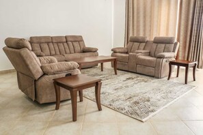 Living area - Cossy apartments ,3 minutes walk to the beach, free WiFi, pool, parking. (Malindi)