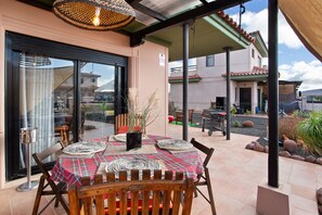 Outdoor dining - Vacation Home 'Amadeus' with Shared Pool, Private Terrace and Wi-Fi (La Oliva)